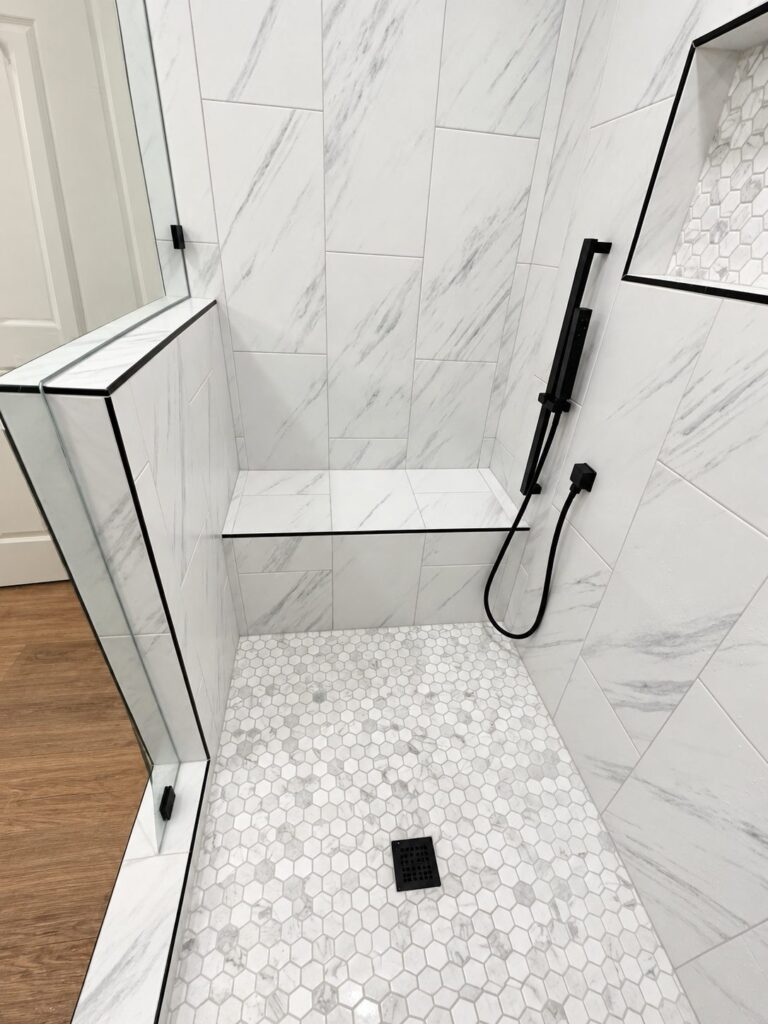 Grapevine shower bench and hexagon mosaic floor