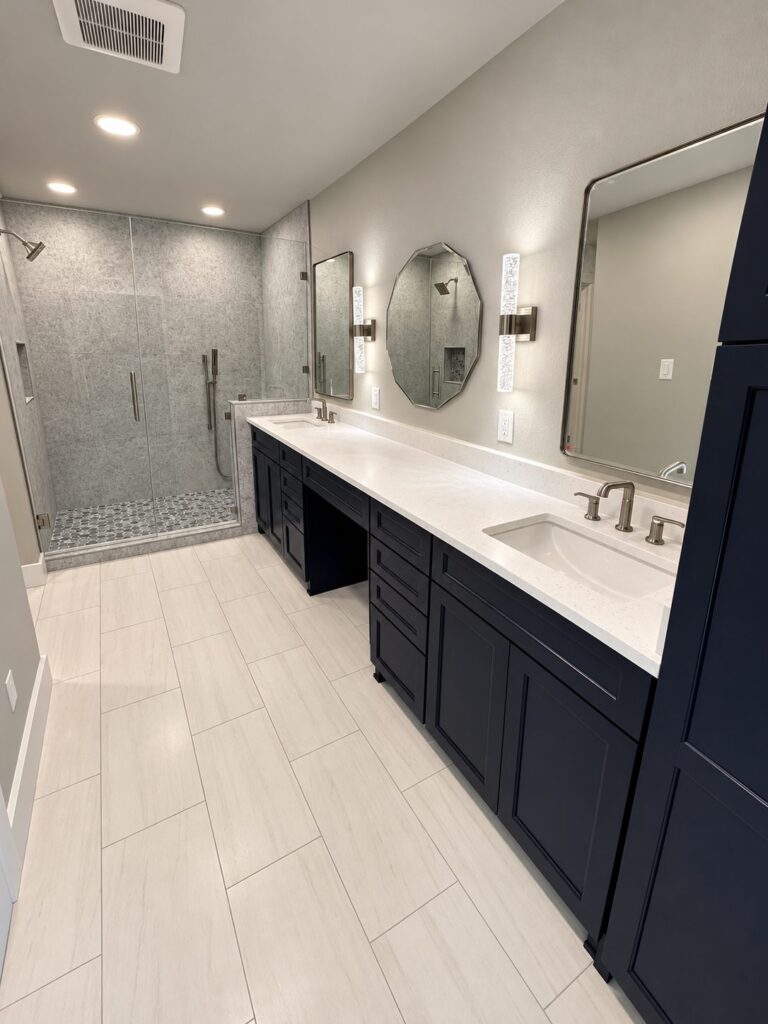 Richardson second bath remodel with navy vanity and walk-in shower