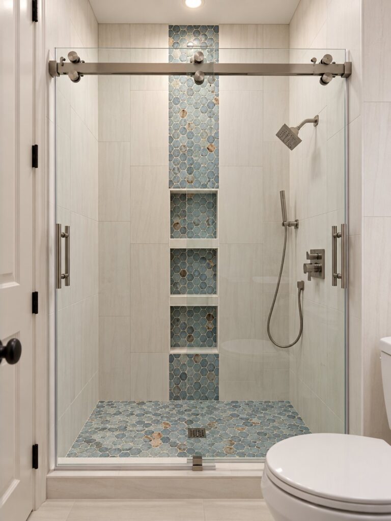 Guest bath shower with blue mosaic accent stripe in Trophy Club